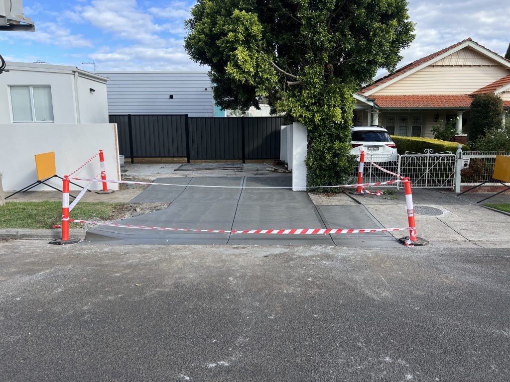 Concrete crossover and driveway entry