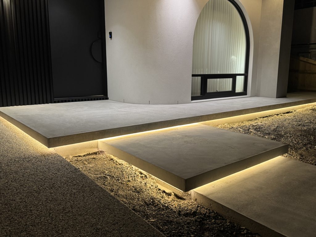 Architectural floating concrete steps with LED lighting