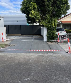 Concrete crossover and driveway entry