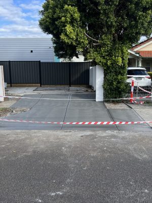 Concrete crossover and driveway entry