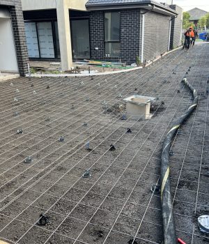 Driveway prepared with steel mesh before the concrete pour