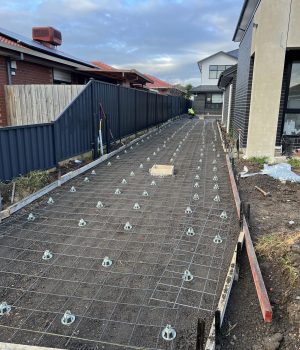 Formwork and mesh set up for a long concrete driveway