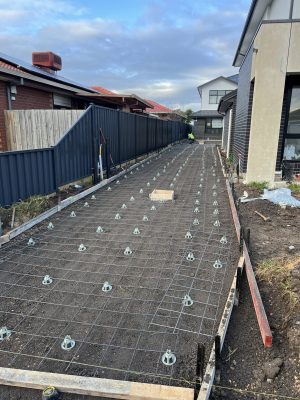 Formwork and mesh set up for a long concrete driveway